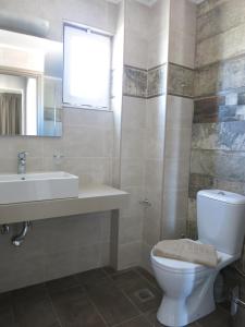 Ванная комната в Pantheon Aparthotel