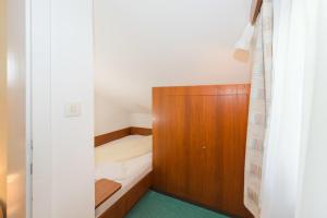 Posteľ alebo postele v izbe v ubytovaní Landhaus Tritscher