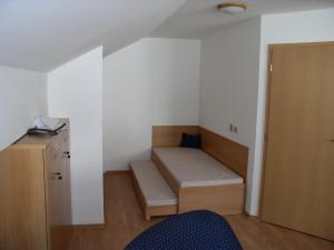 Ένα ή περισσότερα κρεβάτια σε δωμάτιο στο Apartmany Adam a Eva Donovaly
