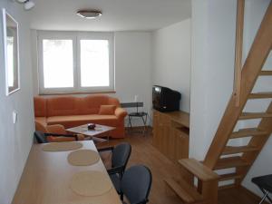 Μια τηλεόραση ή/και κέντρο ψυχαγωγίας στο Apartmany Adam a Eva Donovaly