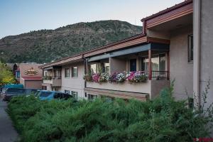 a building with flower boxes on the side of it at The Durango Lodge in Durango