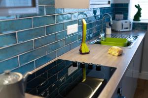 Kuchyň nebo kuchyňský kout v ubytování The Sorting Office - Spacious Modern Home with parking in Central Ambleside