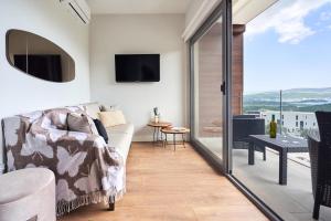 TV a/nebo společenská místnost v ubytování Casa Collection