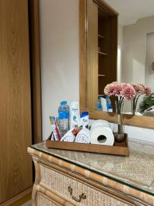 a tray of toilet paper on a counter in a bathroom at New furnished apartment in Cairo