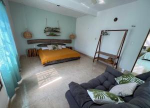 מיטה או מיטות בחדר ב-Casa Tropicana