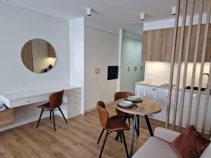 Μια τηλεόραση ή/και κέντρο ψυχαγωγίας στο Apartament Sunray