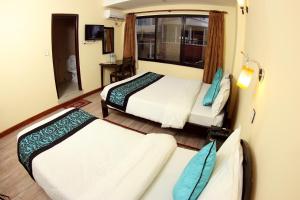 Letto o letti in una camera di Bag Packer's Lodge