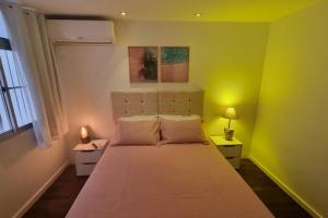Cama ou camas em um quarto em Apartamento 3 quartos no Quadrilátero de Charme em Ipanema