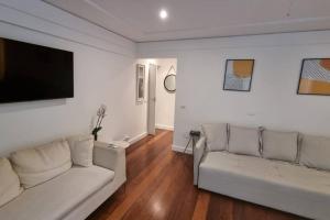 Uma área de estar em Apartamento 3 quartos no Quadrilátero de Charme em Ipanema