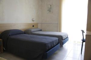 Postel nebo postele na pokoji v ubytování Hotel Narnia