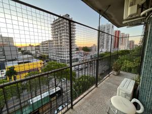 a balcony with a view of a city at Tu departamento en Vicente López in Vicente López