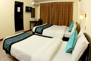 Letto o letti in una camera di Bag Packer's Lodge
