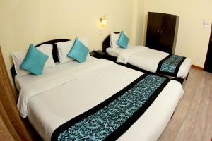 Letto o letti in una camera di Bag Packer's Lodge