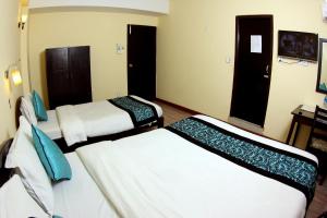 Letto o letti in una camera di Bag Packer's Lodge
