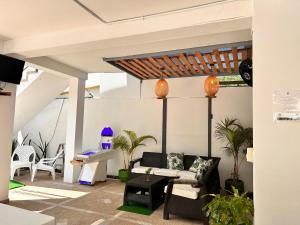 a living room with a couch and a table at CASA VACACIONAL CAMPOSOL in Melgar
