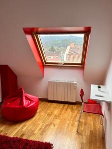 Posezení v ubytování Acogedor apartamento ático en el centro de O Porriño