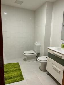 Koupelna v ubytování Acogedor apartamento ático en el centro de O Porriño