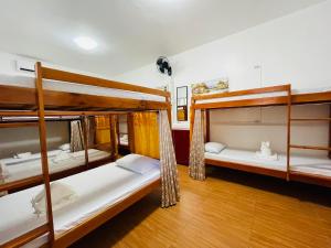 Postel nebo postele na pokoji v ubytování 3 Sisters Guest House 1