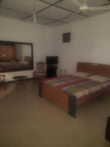 En eller flere senge i et værelse på Royal Mount Hotel