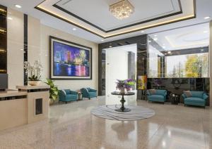 A television and/or entertainment centre at ViAn Hotel And Spa Danang