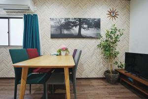 Televiisor ja/või meelelahutuskeskus majutusasutuses North Tengachaya Hotel Apartment