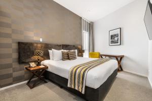 Katil atau katil-katil dalam bilik di Hotel 115