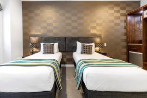 Katil atau katil-katil dalam bilik di Hotel 115