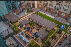 an overhead view of a backyard with a play park at Stylish and Cozy in Dallas Downtown in Dallas