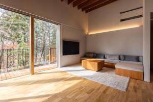Posezení v ubytování Hotarutei Villas