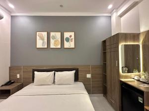 Postel nebo postele na pokoji v ubytování Amora Hotel & Apartment