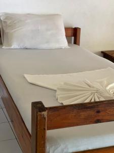 Cama o camas de una habitación en Mana Backpackers and Dive Resort