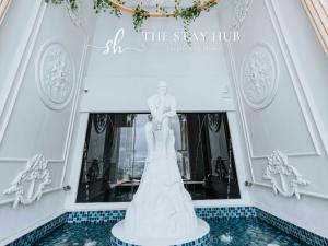 a dress on display in a dressing room at the savoy hub at Arte Cheras Luxury Suites by THE STAY HUB in Kuala Lumpur