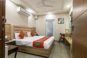 Postel nebo postele na pokoji v ubytování Hotel Anand - Walk in from New Delhi Railway Station + 37 fotografií