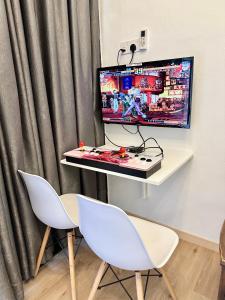 TV a/nebo společenská místnost v ubytování Sakura 1 Homestay Kampar Landed