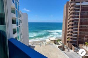 a view of the ocean from the balcony of a building at Oceano 21 in Tijuana