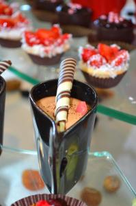 a cup of chocolate pudding with marshmallows and strawberries at Flamingo Grand Hotel & Spa in Albena