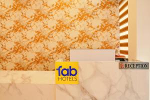 FabHotel The Gravity Inn的证书、奖牌、标识或其他文件