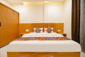 FabHotel The Gravity Inn客房内的一张或多张床位