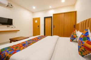 FabHotel The Gravity Inn客房内的一张或多张床位