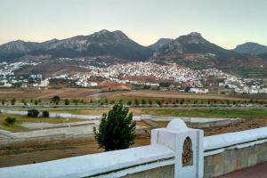 a view of a city with mountains in the background at Apartamento en Tetuán in Tetouan