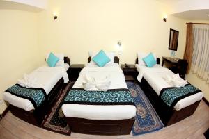 Letto o letti in una camera di Bag Packer's Lodge