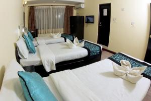 Letto o letti in una camera di Bag Packer's Lodge