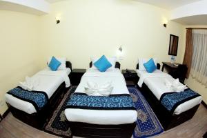 Letto o letti in una camera di Bag Packer's Lodge