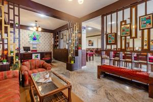 Posezení v ubytování Treebo Shimla Ayurvedic Retreat Kufri