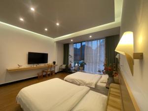 Televisyen dan/atau pusat hiburan di 林涧小栈Linger house
