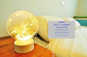 Katil atau katil-katil dalam bilik di Xie Tong Homestay