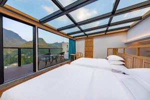 Fotografie z fotogalerie ubytování Zhangjiajie Qiquan Vacation B&B v destinaci Čang-ťia-ťie