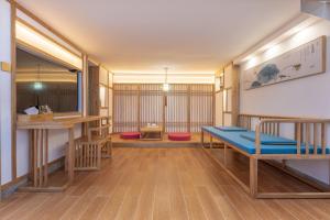 Fotografie z fotogalerie ubytování Zhangjiajie Qiquan Vacation B&B v destinaci Čang-ťia-ťie