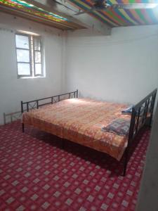 A bed or beds in a room at Moray homestay