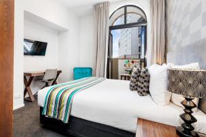 Katil atau katil-katil dalam bilik di Hotel 115